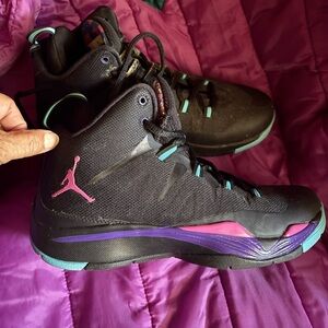 Jordan’s Black and Purple High-Top Sneakers